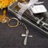Metal cross key chain with beaded design
