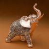 Glorious Champagne Gold antique standing elephant with clear stones