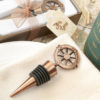 Compass design bronze metal bottle stopper from fashioncraft