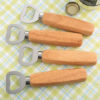Wood handle bottle opener with solid stainless steel top opener