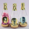 Personalized metallics gold accented clear champagne bottle container
