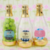 Personalized expressions gold accented clear champagne bottle container