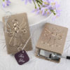Angel themed mirror compact with a champagne gold finish