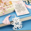 Lovable teddy bear design bookmark favors from the book lovers collection.