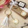 Gold metal heart themed white tassel key chain